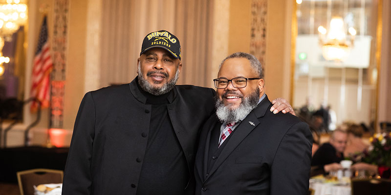 Two black male veterans at military ball