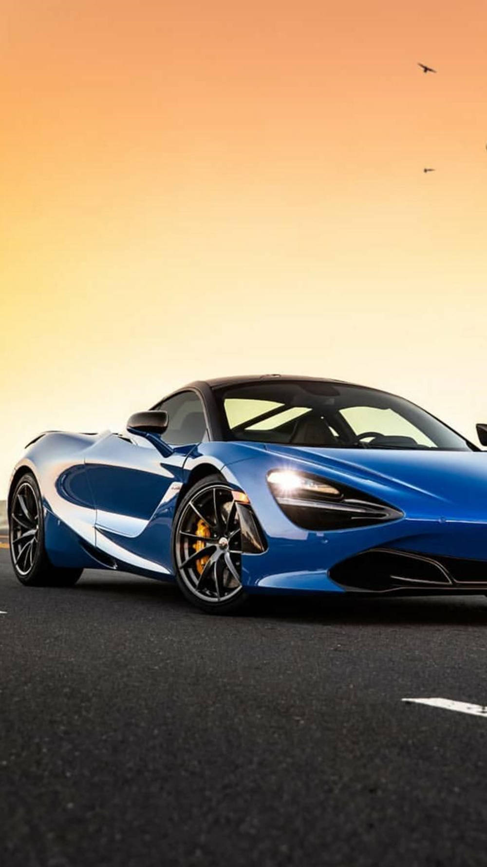 Blauermclaren 720s Unter Sonnenuntergang Telefon Wallpaper