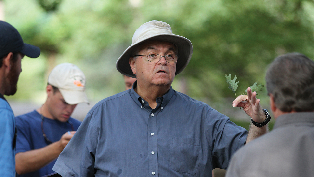 harry ponder teaches some students outside