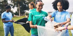 Students volunteering to pick up trash.