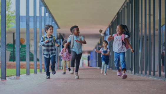 School children running and laughing