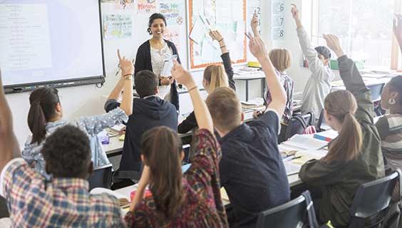 Teacher in front of classroom