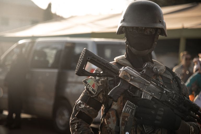 A member of the Malian special forces stands guard during the ceremony that celebrates the national army day