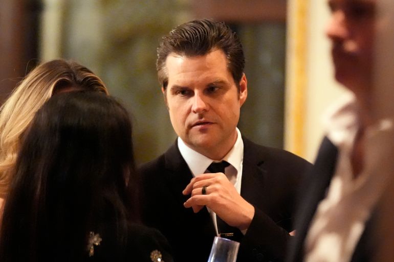 Gaetz speaks with people at Mar-A-Lago