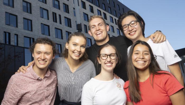 Group of ANU students smiling at the camera