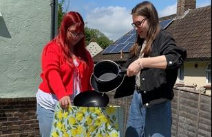Brighton Reuse team with items for students