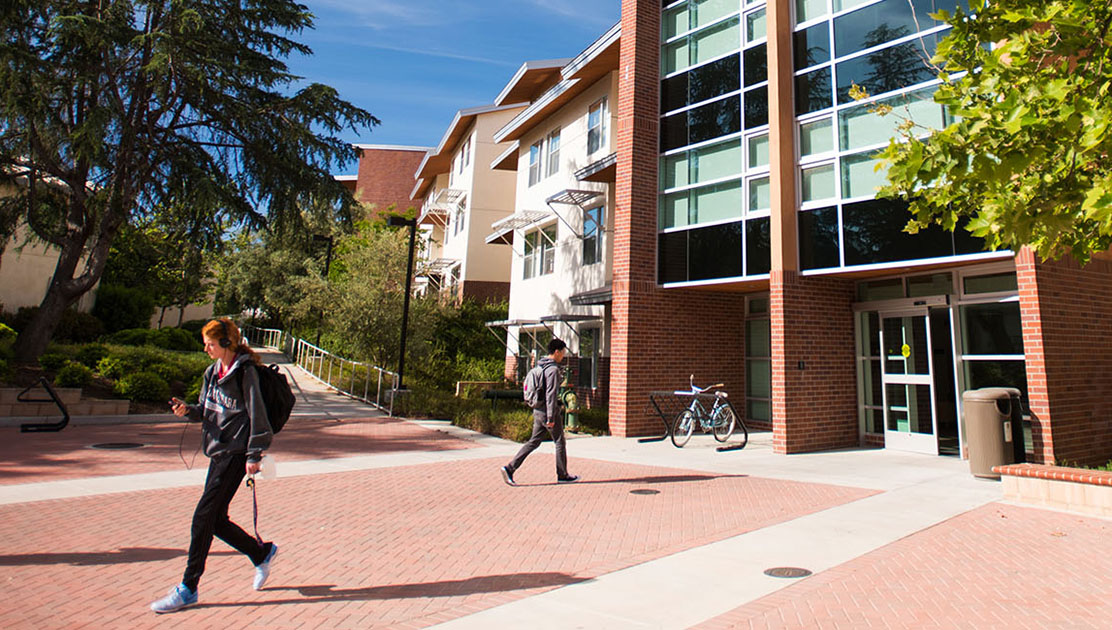 Students walking near residence hall