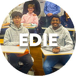 undergraduate students sit together in a classroom