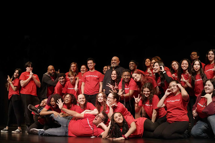 Students and CMU Drama professors posing on stage.