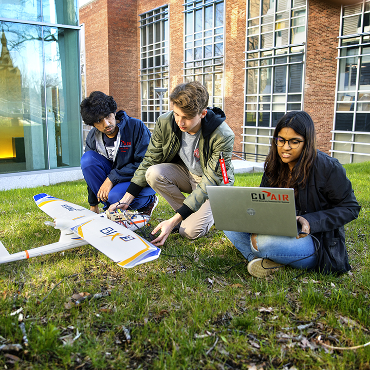 Students working on an airplane