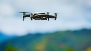 A drone hovers above the landscape.