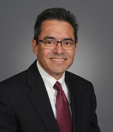 A portrait of College of Business Dean Mark Suazo