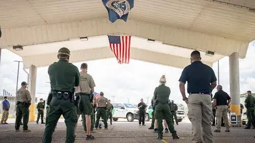 Various law enforcement officers from across DHS.