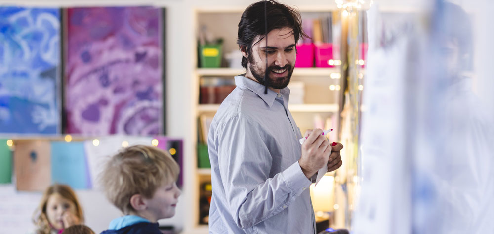 Teacher in Falk school classroom