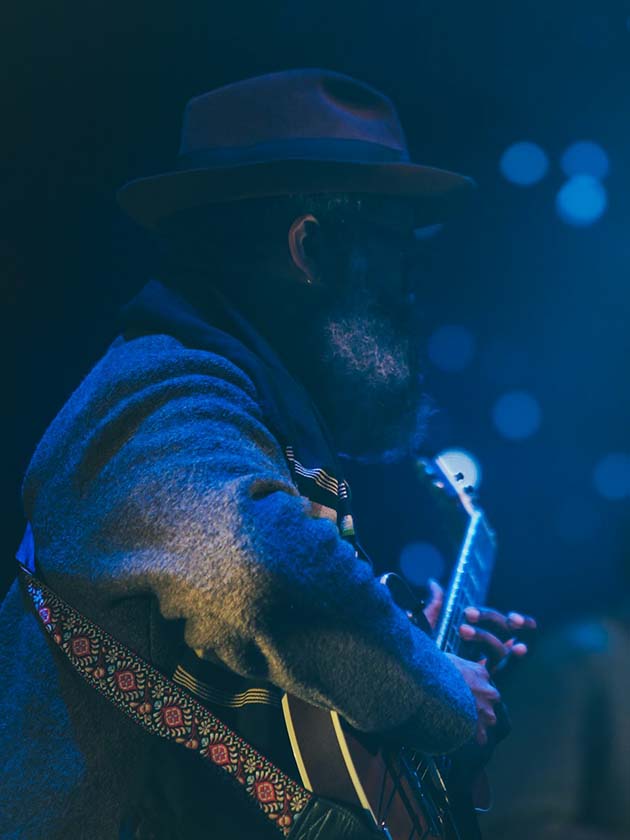 A man playing blues music, a historically popular genre in Chicago, Illinois, USA near ELS Language Centers.