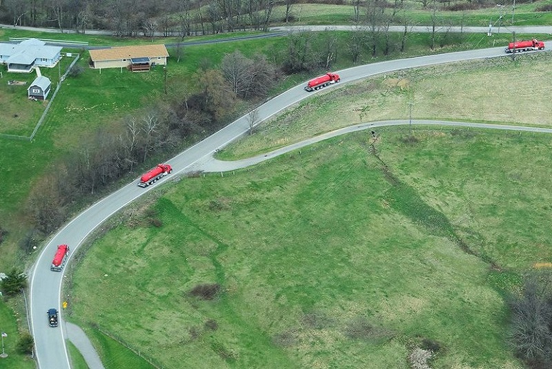 Trucks hauling brine in Moundsville, WV. Photo by Ted Auch.