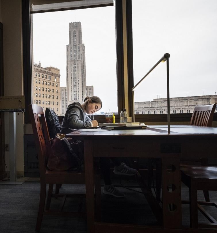 Student studying at Pitt