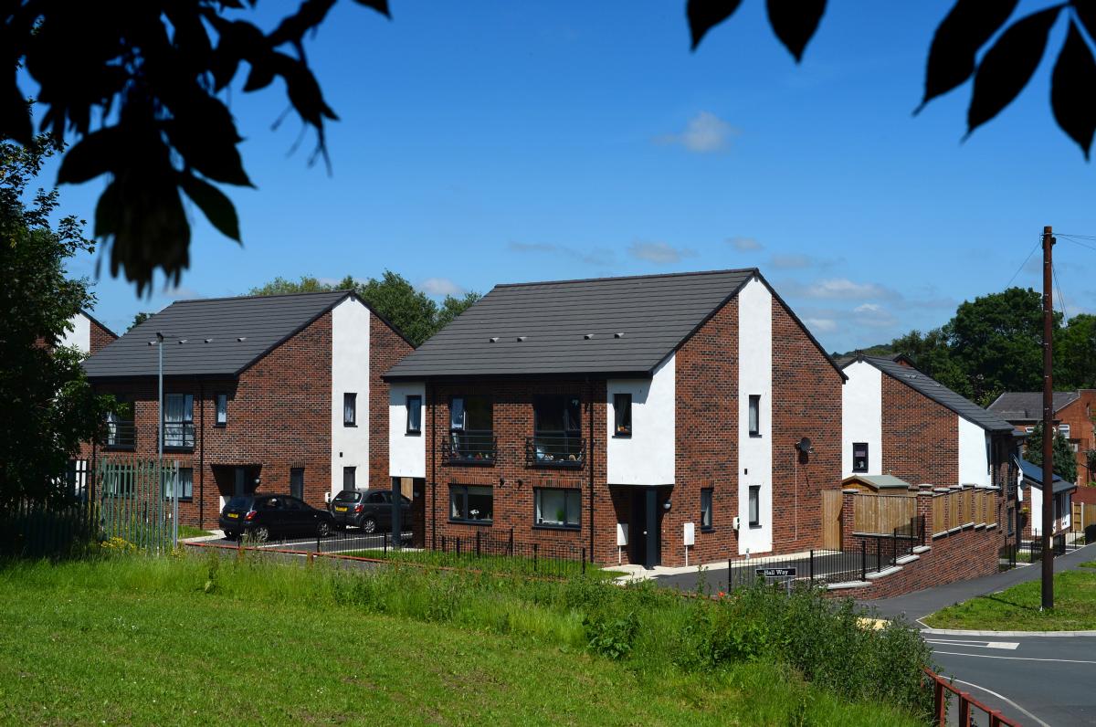 Inage of accessible Habinteg two storey brick homes in a leafy, sunny suburb in Leeds