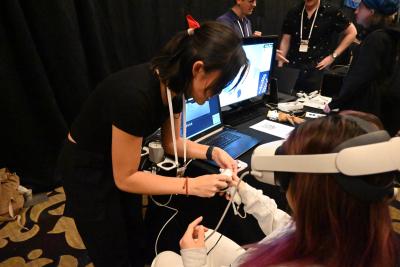 Vivian facilitating a demo at UIST 2023. [This image is from the official ACM UIST photo album]