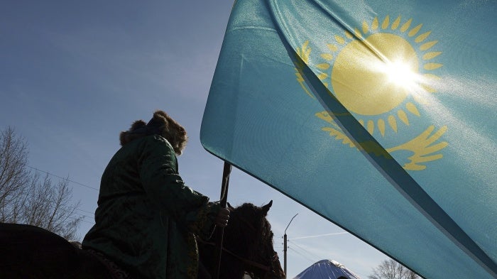 Kazakhstan’s national flag flies in the village of Saumalkol, North Kazakhstan region, March 22, 2023. 