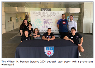 The William H. Hannon Librarys 2024 outreach team poses with a promotional whiteboard.