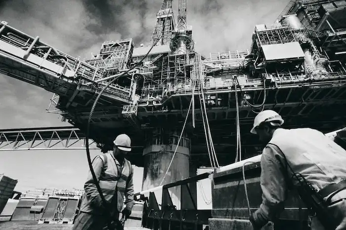 Two men on industrial platform