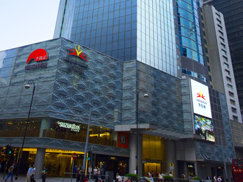 People spending leisure time outside Infinitus Plaza shopping Arcade