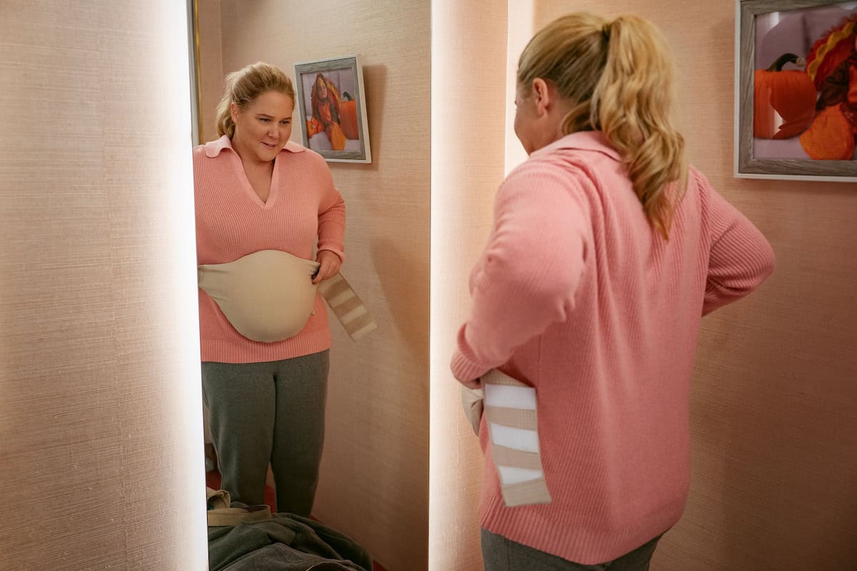 Amy Schumer straps on a fake baby bump in the trailer for Kinda Pregnant