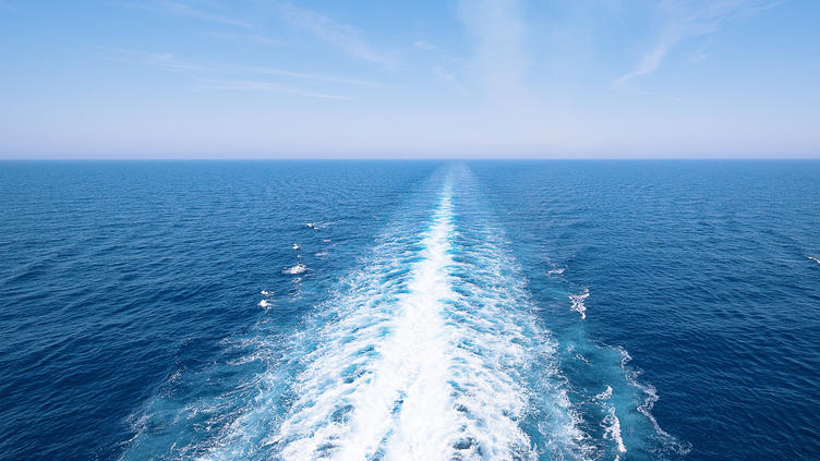 boat trail in the water