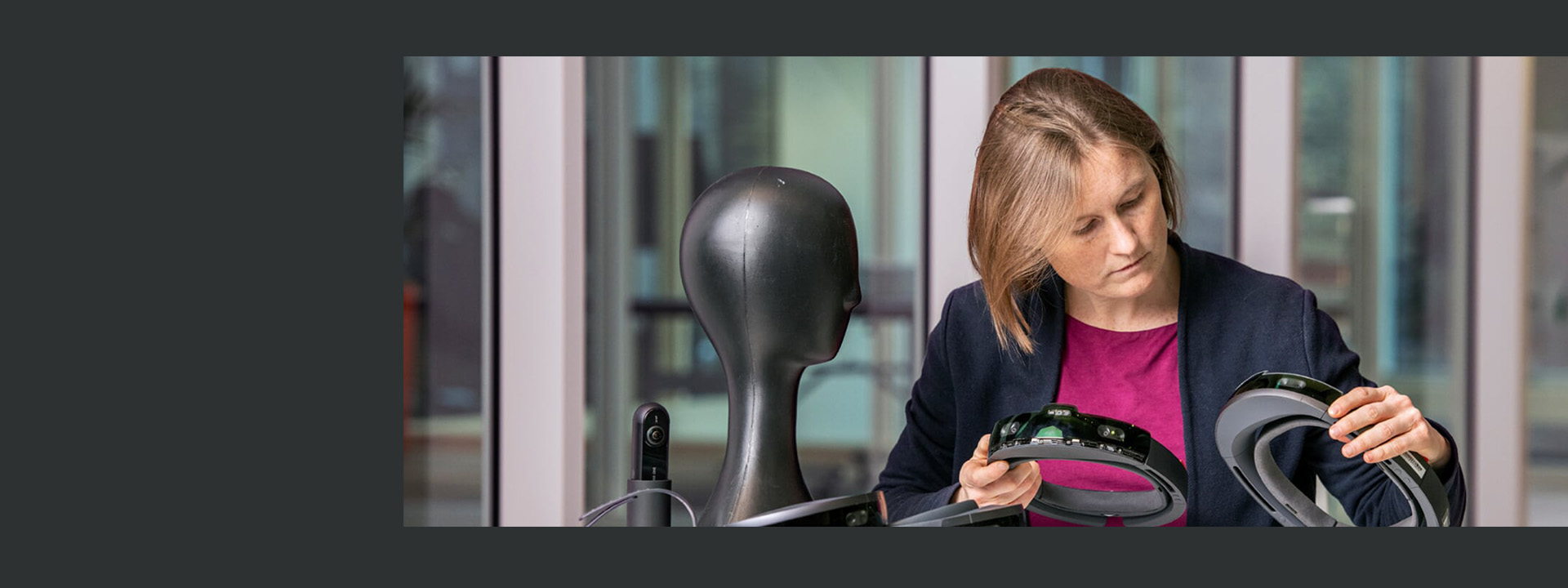 Female scientist looking at HoloLens