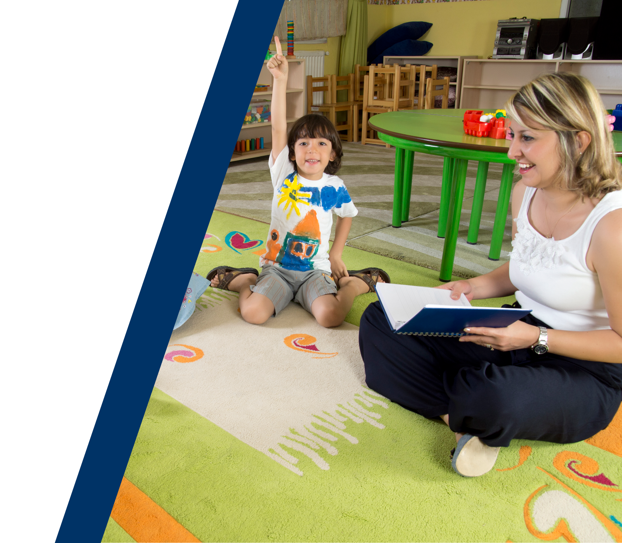 teacher reading to children in a classroom