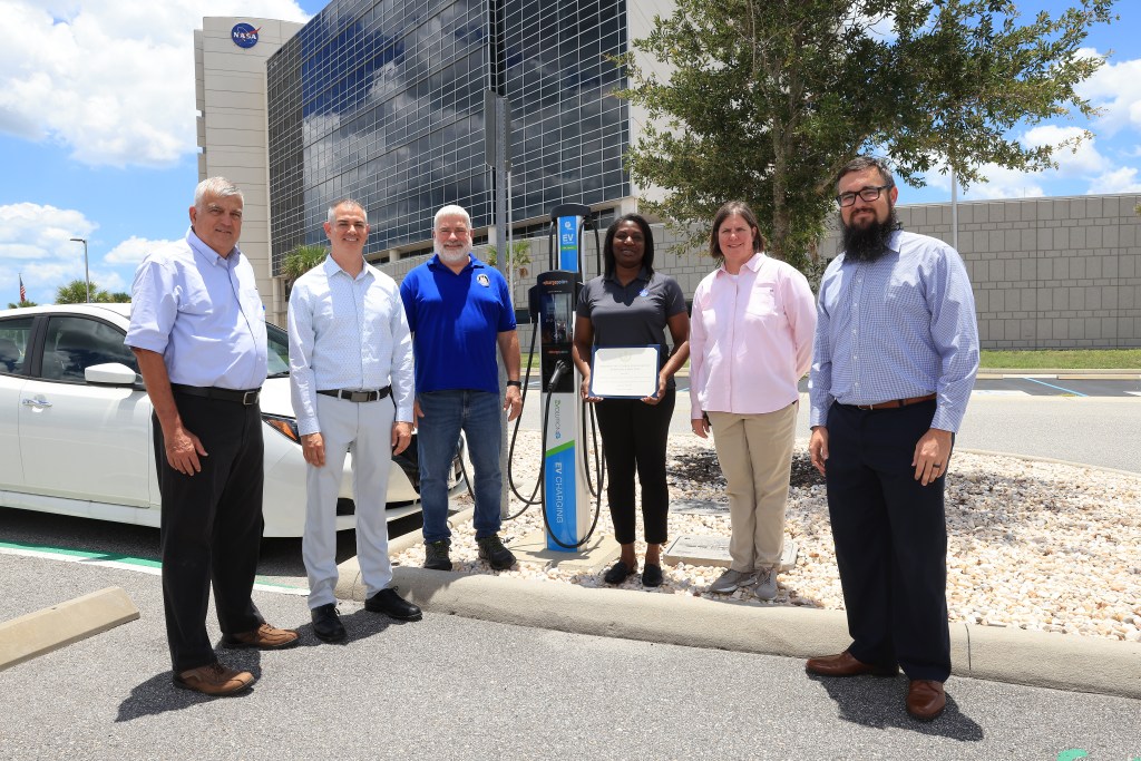 Image of six of the seven Kennedy Space Center employees who received national recognition from the White House for their sustainability efforts.