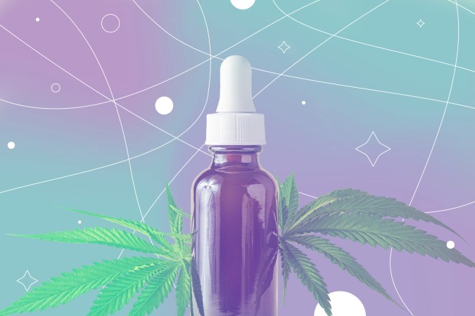 A CBD oil bottle with cannabis or hemp leaves