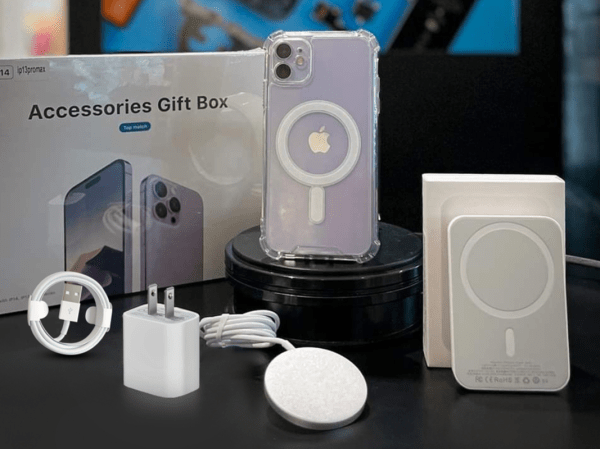 An iPhone accessory bundle on a table.