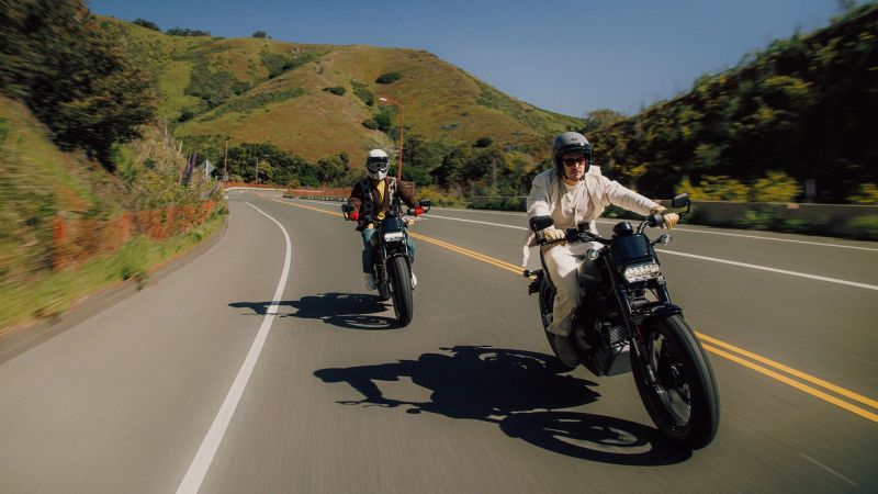 two electric bikes on a rural road