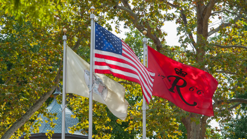 Flags on the main plaza on the Camden Campus.