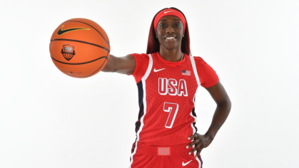 Kahleah Cooper holding a basketball