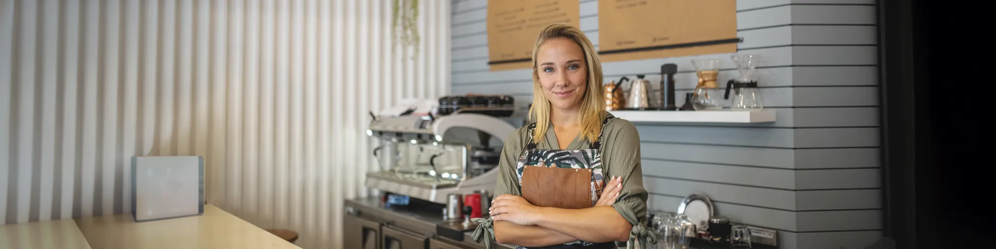 Cafe shop owner smiling