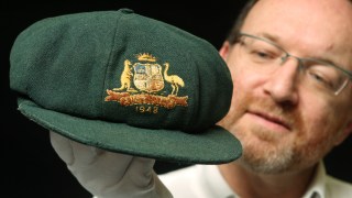 Bradman’s famous baggy green is not expected to reach the huge sum Warne’s cap went for in 2020