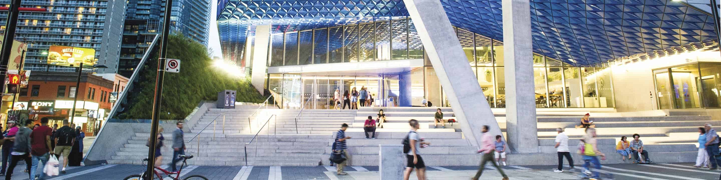 people walking in front of the Student Learning Centre