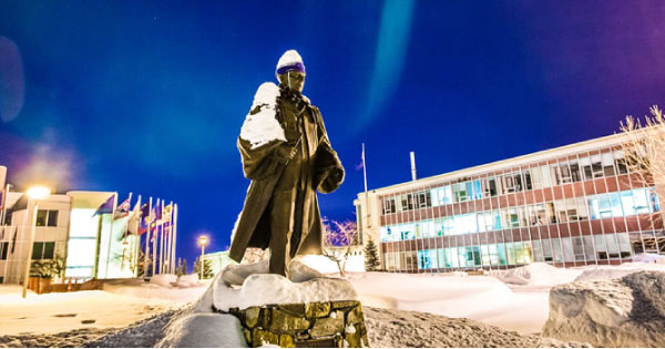 Aurora over UAF Cornerstone Plaza and Bunnell statue