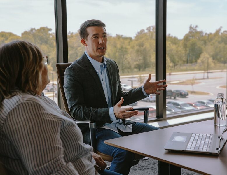 man talking in a meeting