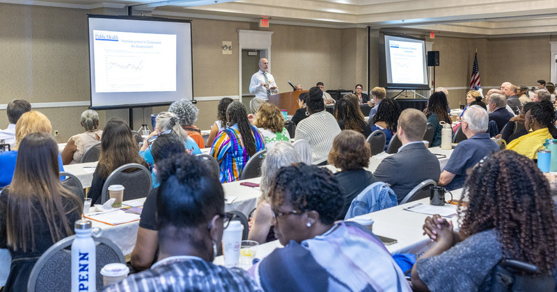 Attendees at a presentation by the Biden School Housing Initiative