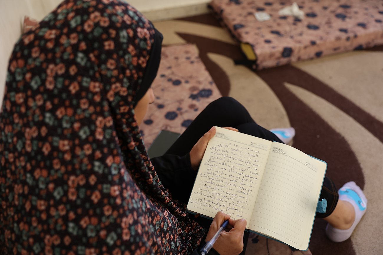 Aid worker, Hala with her diary