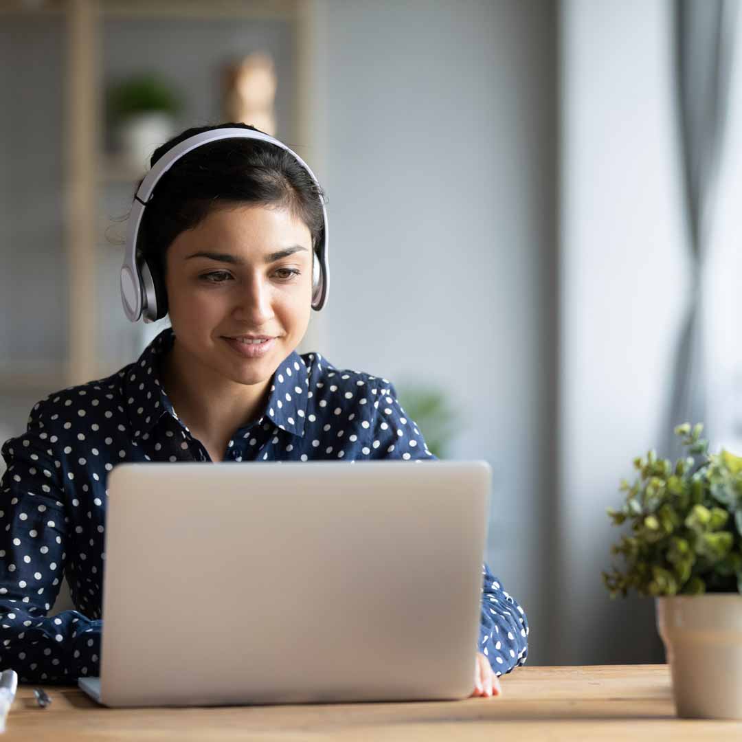 Woman using a laptop. Photo: iStock