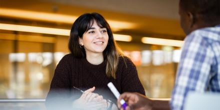 UTS PhD student Somayeh Sadegh Koohestani chatting with another student