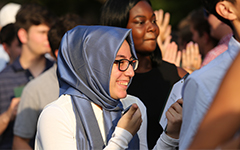 Smiling new students are welcomed to campus during Opening Convocation